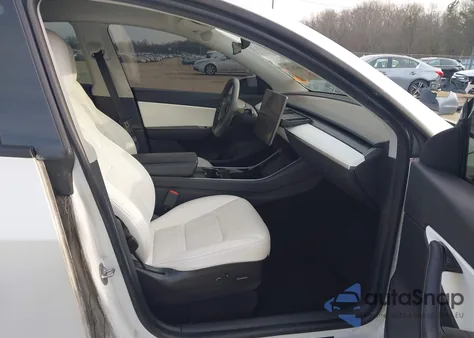 2021 Tesla Model Y Standard Range Rear-Wheel Drive from USA, damaged, VIN 5YJYGDED7MF103408